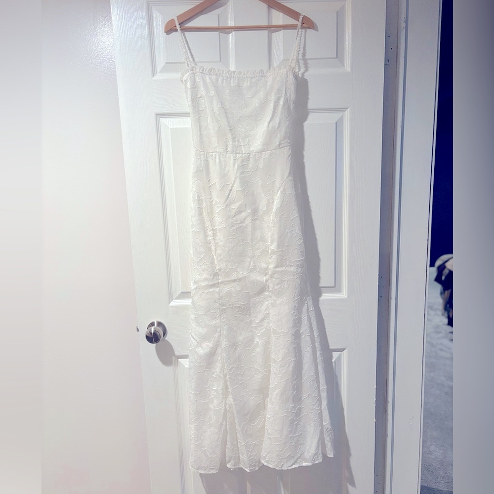 Backless white/ivory reception wedding dress.